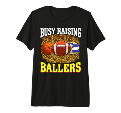 Busy Raising Ballers Basketball Football T-Shirt - Trendy Graphic Unisex - T-Shirt, Sweatshirt, Hoodie